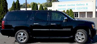 2010 Chevrolet Suburban 1500, 4 Door, Sport Utility LTZ. Black with black leather interior. 55,166 miles