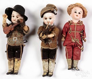 Three small bisque head character dolls, 19th c.