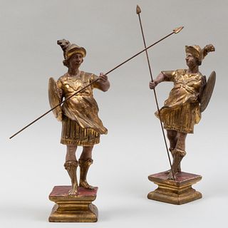 Pair of Continental Painted and Parcel-Gilt Roman Foot Soldiers on Stands