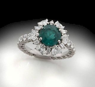 Platinum, emerald and diamond ring