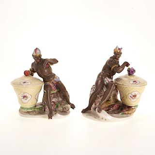 Pr Nymphenberg blackamoor porcelain sweetmeat jars