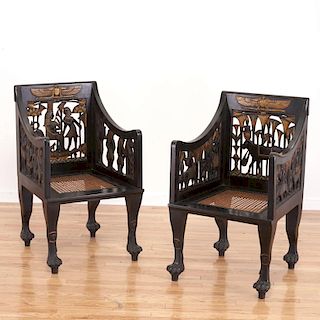 Pair Egyptian Revival gilt and ebonized armchairs