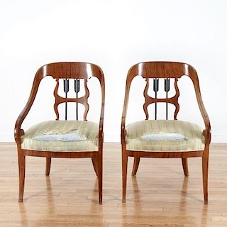 Pair Empire style parcel ebonized walnut armchairs