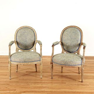 Harlequin pair Louis XVI gray painted fauteuils