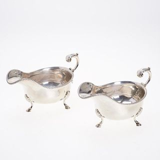 Pair Edwardian sterling silver footed sauceboats
