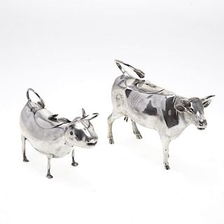 Two Dutch sterling cow creamers