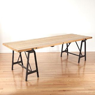 Industrial cast iron, reclaimed wood dining table
