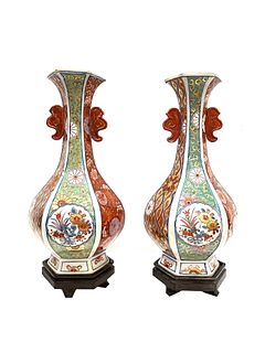 Pair of Chinese Porcelain Vases with wooden bases