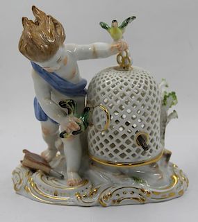 Meissen Figure of a Putti with Birdcage.