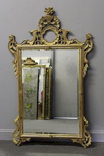 Italian Carved and Giltwood Mirror.