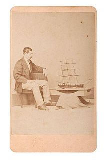 CDV of Farragut's First Mate Harry Miller with Model of the USS Hartford 
