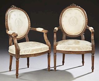 Pair of French Louis XVI Style Carved Beech Fauteu