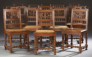 Set of Eight French Henri II Carved Walnut Dining