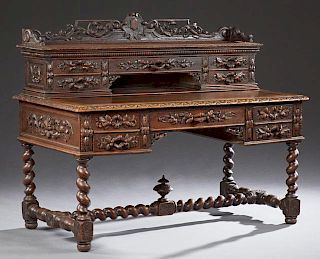 Henri II Style Carved Oak Desk, 19th c., with a pi