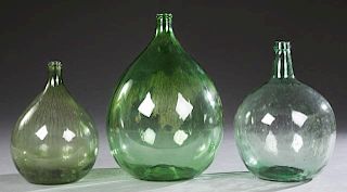 Group of Three French Mold Blown Glass Wine Carboy