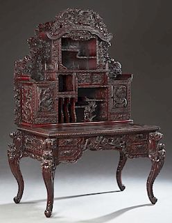 Chinese Style Carved Mahogany Desk, 20th c., the a