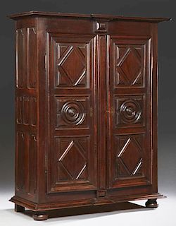 French Louis XIII Style Carved Oak Armoire, 19th c