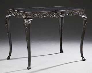 Wrought Iron Patio Table, 20th c., the inset glass