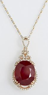 14K Yellow Gold Pendant, with a 19.67 oval ruby at