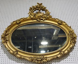 Antique & Finely Carved Oval Giltwood Mirror.