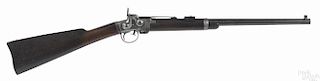 Smith breech loading saddle ring carbine, .50 caliber, with a walnut stock, a good cartouche