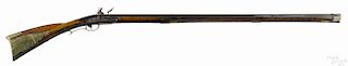 Full stock Pennsylvania flintlock long rifle, approximately .38 caliber, with a tiger maple stock