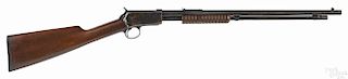 Winchester model 1906 slide action takedown rifle, .22 caliber, tube fed, with a 22'' barrel.
