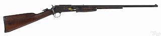 Colt Lightning small frame slide action rifle, .22 caliber, tube fed, with a tang peep sight
