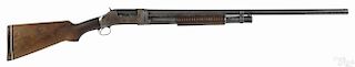 Winchester model 1897 pump action shotgun, 12 gauge, with a 30'' round barrel. Serial #900075.