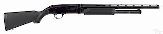 Mossberg model 500AT pump action shotgun, 12 gauge, with a ventilated rib, a black synthetic stock