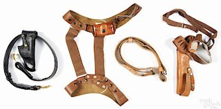 Three holsters and belts, to include a black leather US Army General Officer's belt