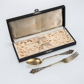 A NORWEGIAN SILVER-GILT AND PLIQUE-A-JOUR FORK AND SPOON