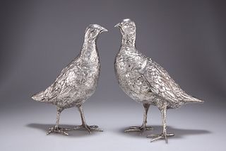 A PAIR OF CONTINENTAL SILVER GROUSE TABLE ORNAMENTS