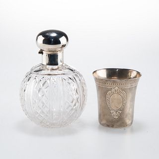 A FRENCH ENGINE-TURNED SILVER BEAKER AND A GEORGE V SILVER-TOPPED CUT-GLASS SCENT BOTTLE
