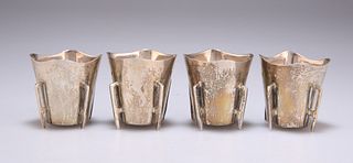 A SET OF FOUR EDWARDIAN SILVER MINIATURE METHER CUPS