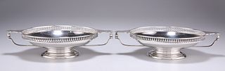 A PAIR OF GEORGE V SILVER TWO-HANDLED BON-BON DISHES