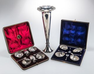 AN EDWARDIAN SILVER VASE AND TWO CASED SILVER CONDIMENT/SALT SETS