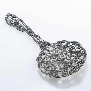 A LATE VICTORIAN SILVER SERVING SPOON