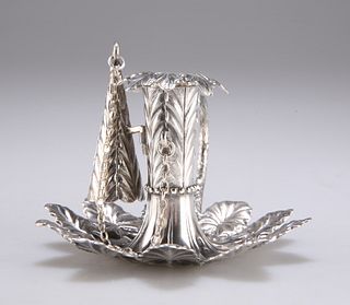 AN EARLY VICTORIAN SILVER LEAF-FORM CHAMBERSTICK
