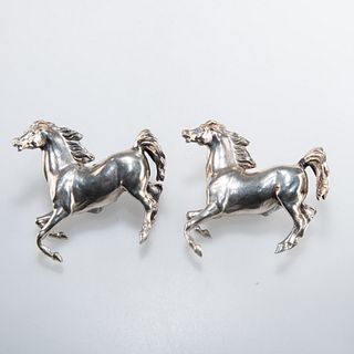 A PAIR OF VICTORIAN CAST SILVER MODELS OF HORSES