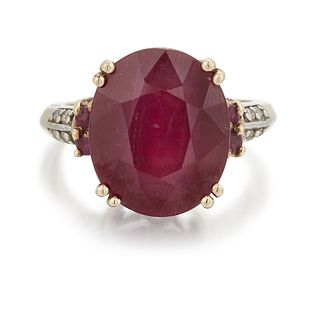 A 9 CARAT GOLD RUBY AND DIAMOND RING