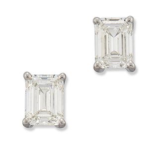 A PAIR OF 18 CARAT WHITE GOLD SOLITAIRE OCTAGONAL-CUT DIAMOND EARRINGS
