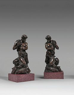 TWO STATUETTES in patinated bronze 