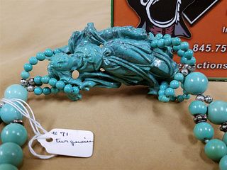 DOUBLE STRAND TURQUOISE BEAD NECKLACE W/ CARVED TURQUOISE FIGURE 34"