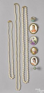 Assorted vintage jewelry, to include three faux pearl necklaces, four porcelain brooches