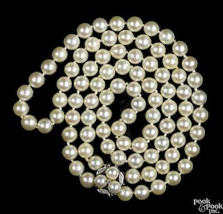 Cultured pearl necklace with 8mm pearls and a 14K white gold clasp set with three pearls