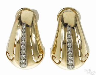 14K yellow gold and diamond earrings, each set with a line of ten diamonds, .50ct, 7.7 dwt.