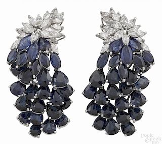18K white gold, sapphire, and diamond earrings, each set with twenty-six sapphires, 65ct