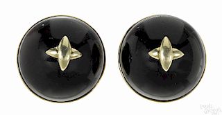 14K yellow gold and onyx clip earrings, each with a round onyx topped with a gold star