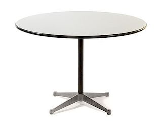* Charles and Ray Eames (American, 1907-1978; 1912-1988), HERMAN MILLER, CIRCA 1970s, a circular dining table